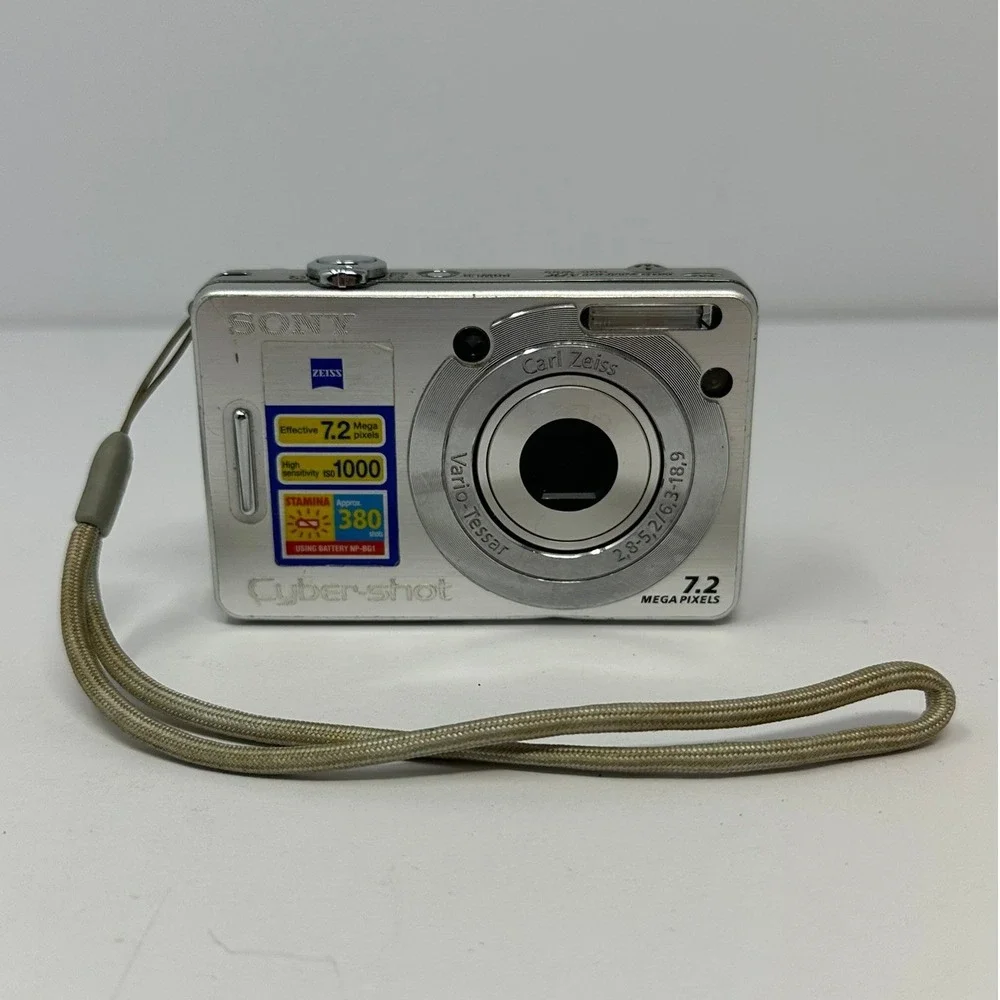 Sony Cyber-shot DSC-W55 Silver 7.2MP Digital Camera and Accessories B0
